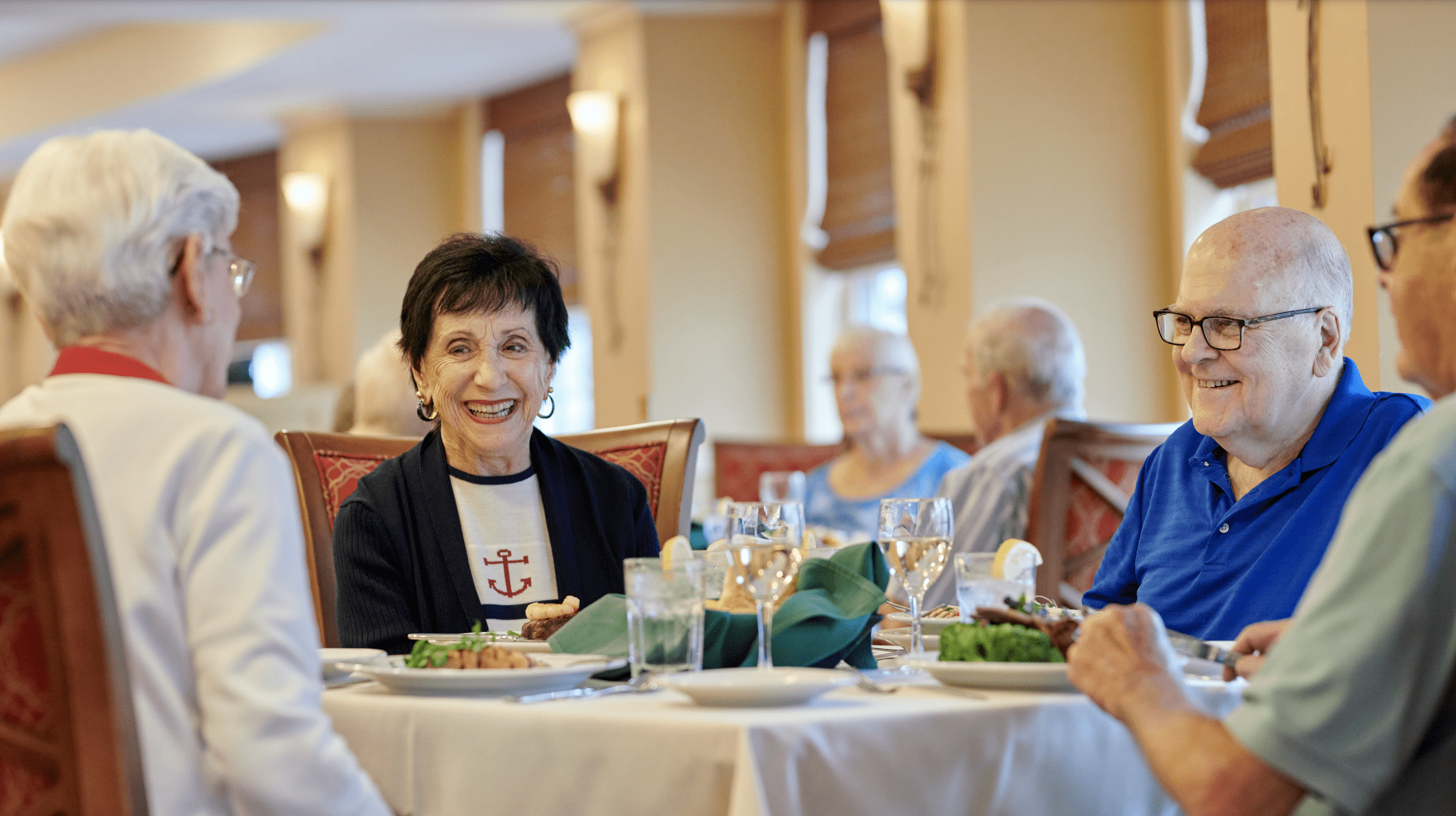 seniors enjoying dinner together at canterbury woods williamsville