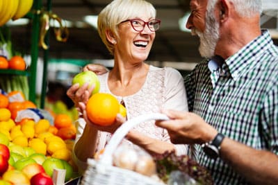 senior couple at the farmers market