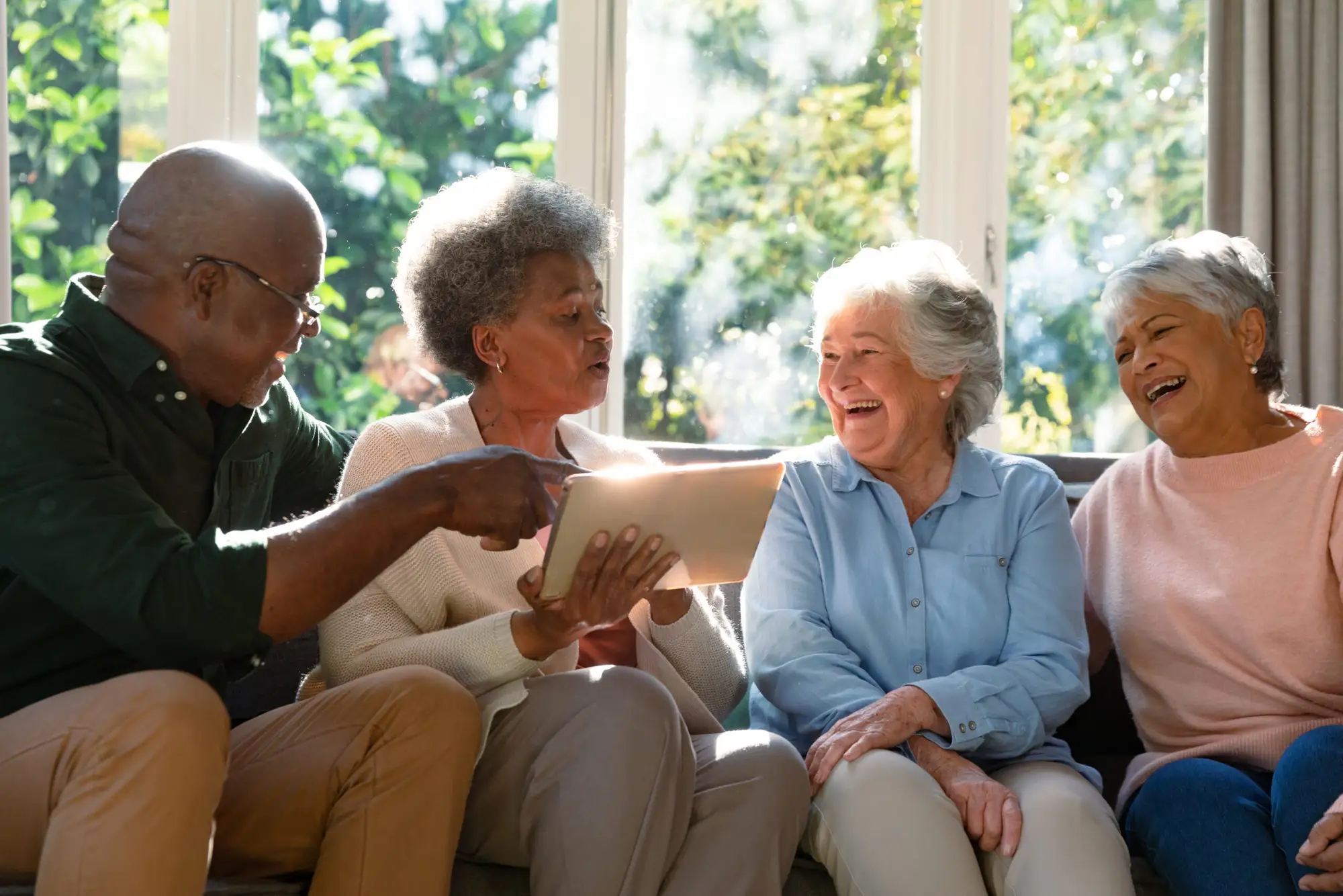 Canterbury residents smiling on a couch