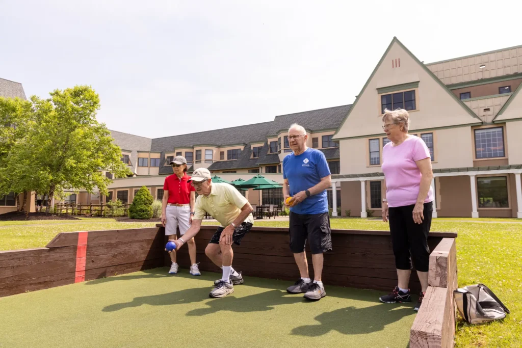 seniors at Canterbury Woods Williamsville playing bocce ball