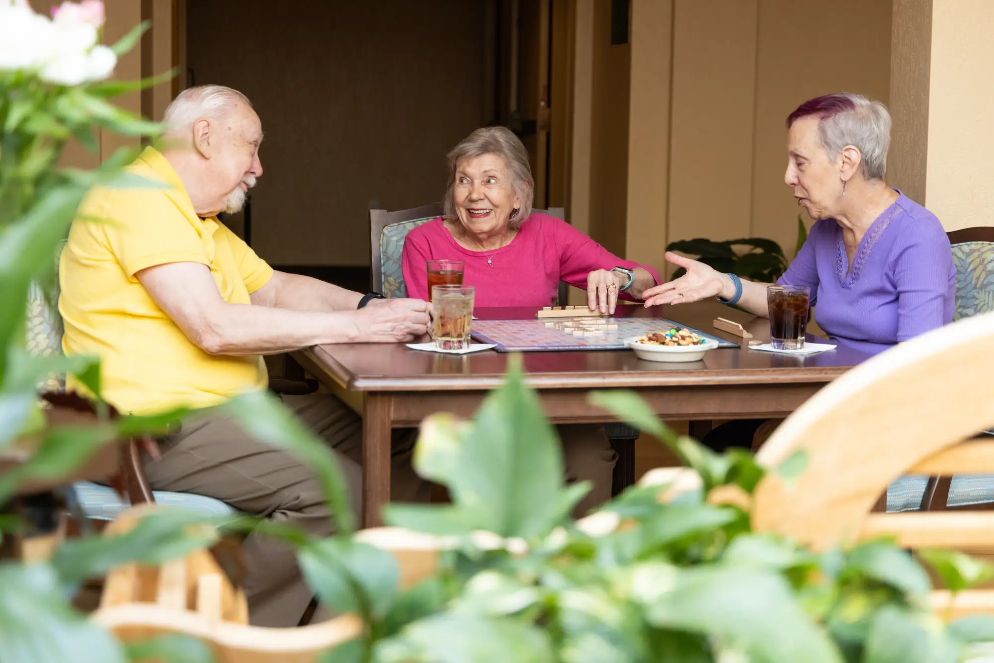 seniors at Canterbury Woods Williamsville eating outside; they figured out their best age to move into independent living