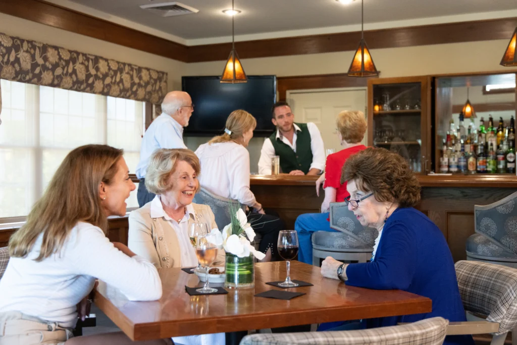 seniors enjoying the lounge at Canterbury Woods Williamsville 